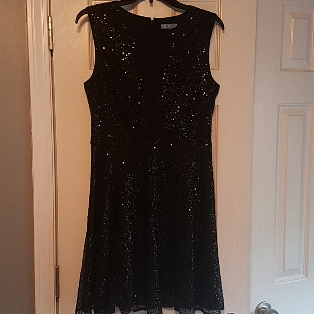 Sleeveless black dress with sequins